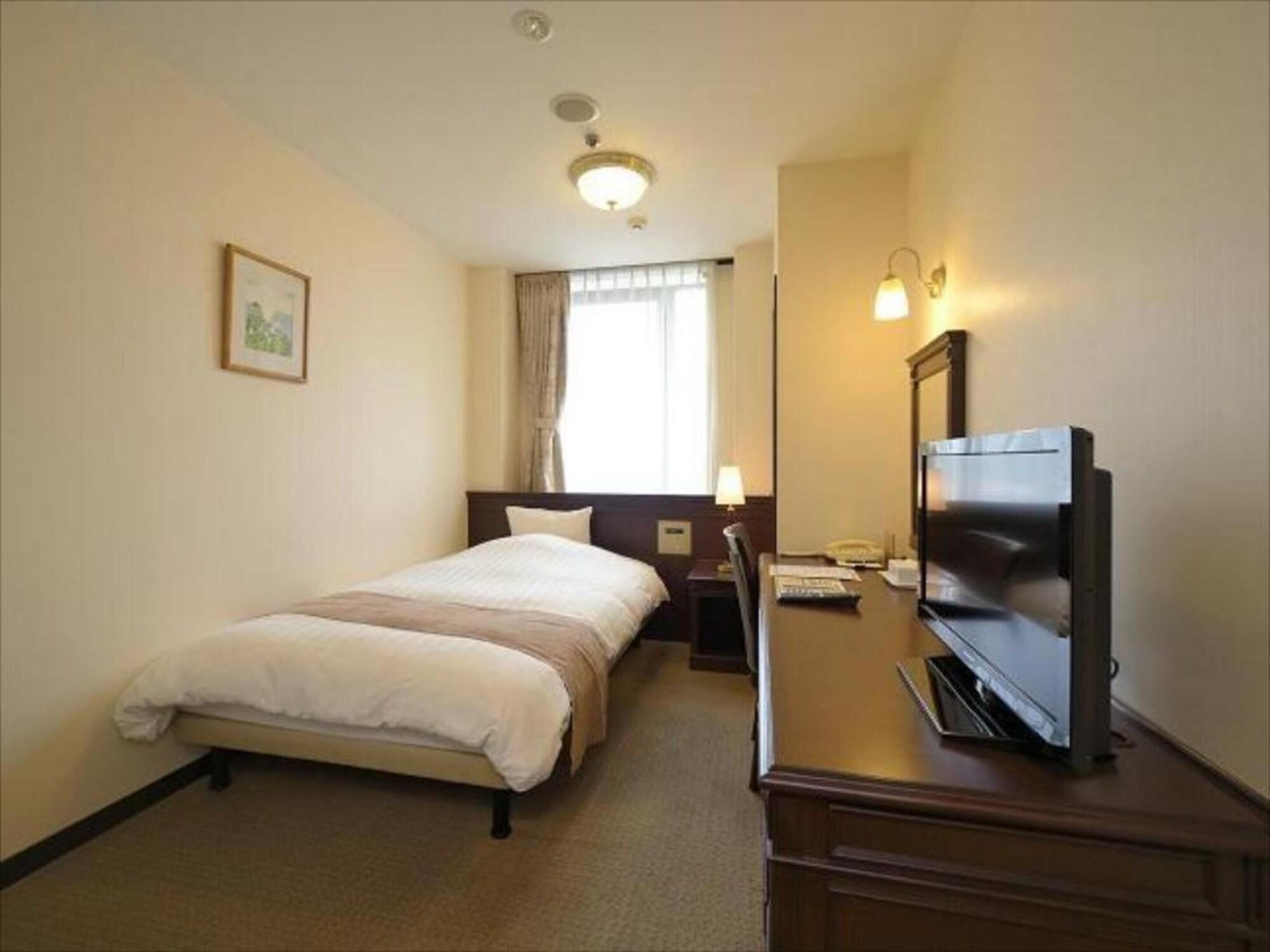 Amami Sunplaza Hotel Extérieur photo