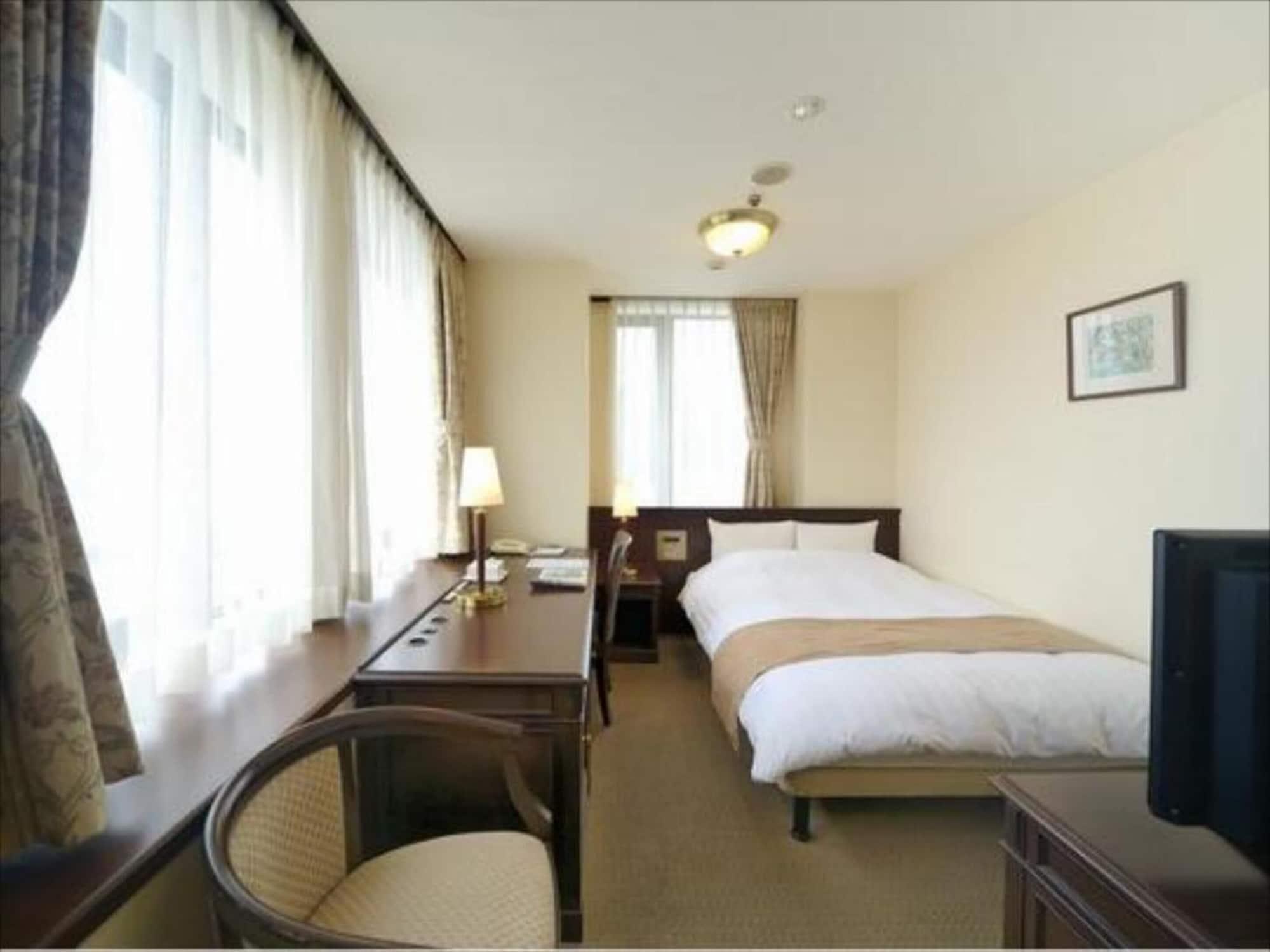 Amami Sunplaza Hotel Extérieur photo