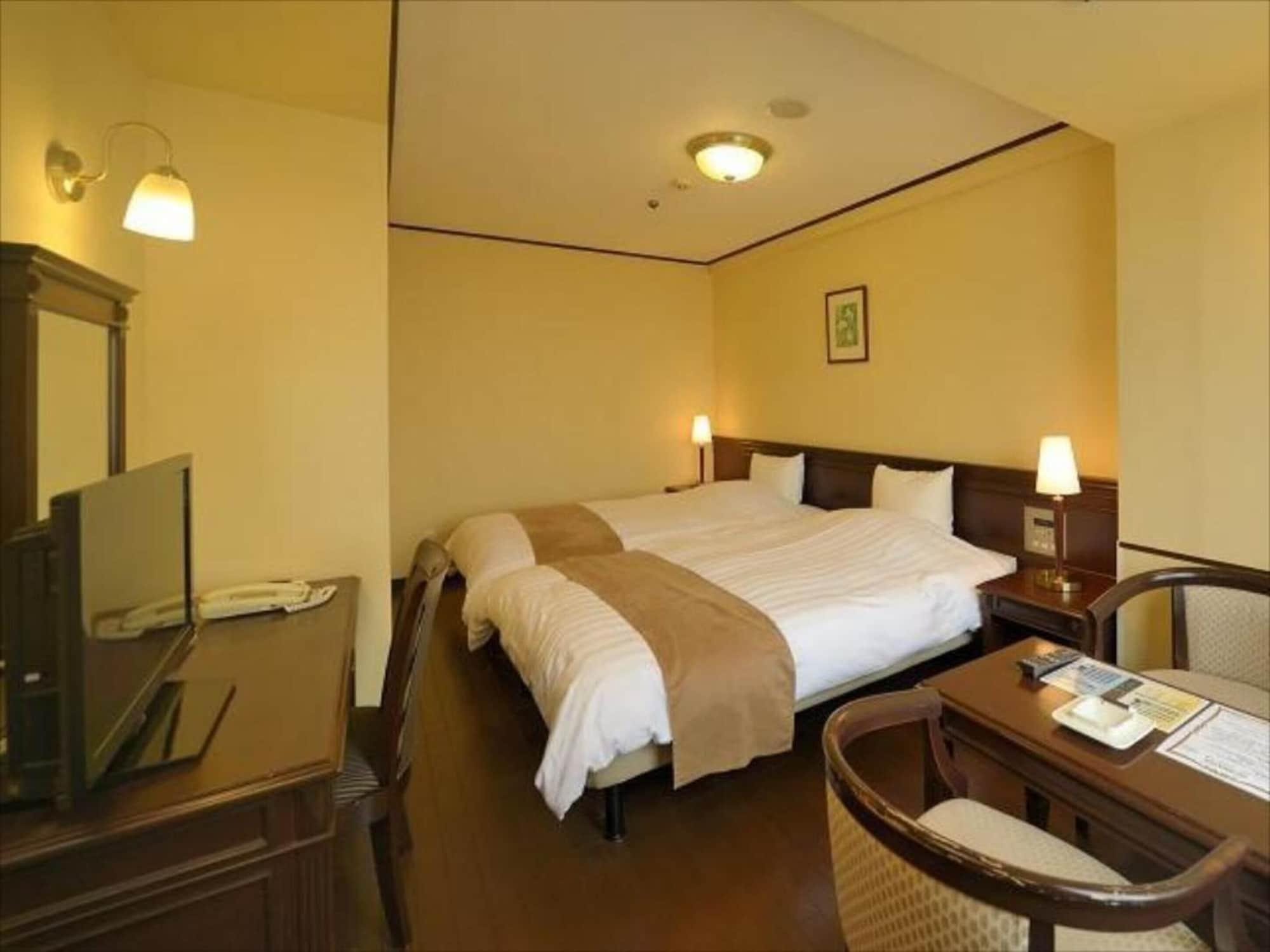 Amami Sunplaza Hotel Extérieur photo