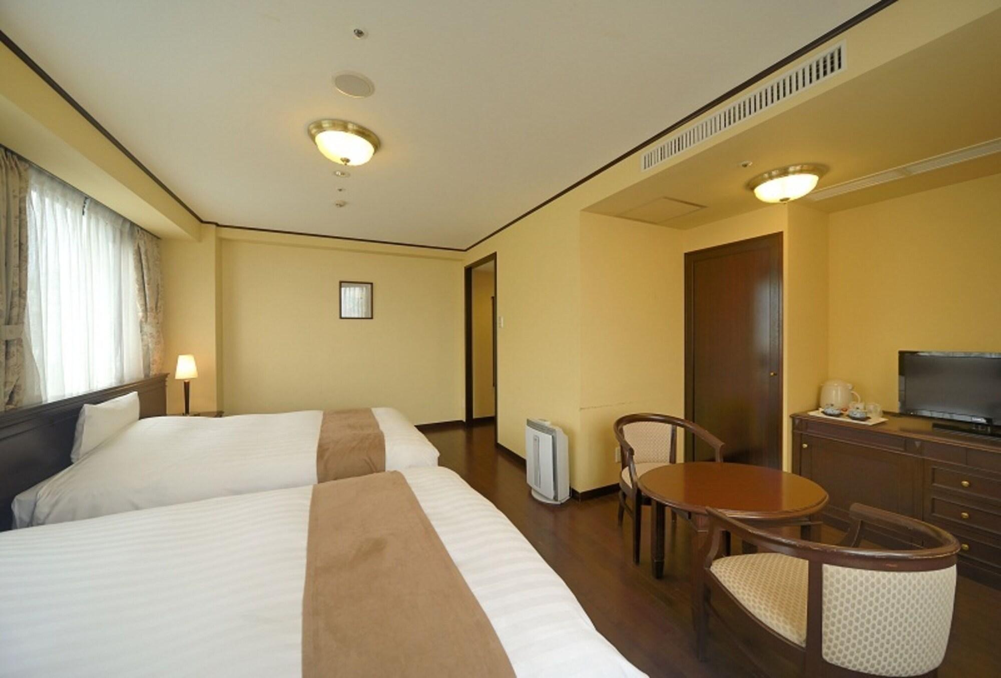 Amami Sunplaza Hotel Extérieur photo