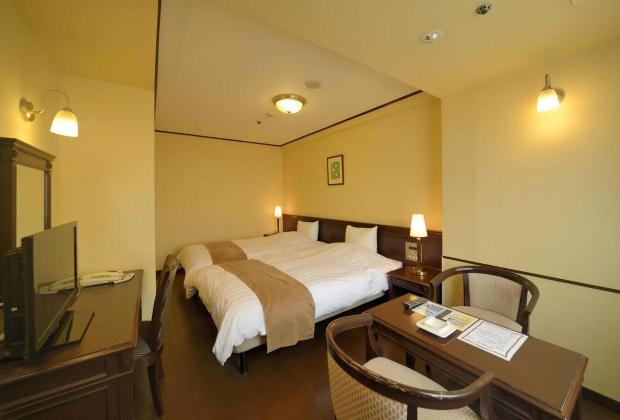 Amami Sunplaza Hotel Extérieur photo