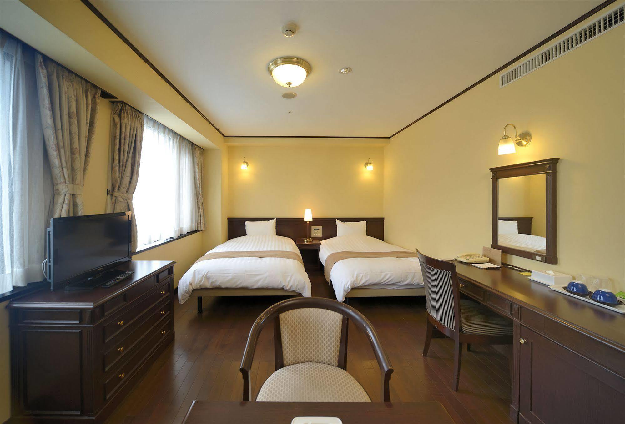 Amami Sunplaza Hotel Extérieur photo