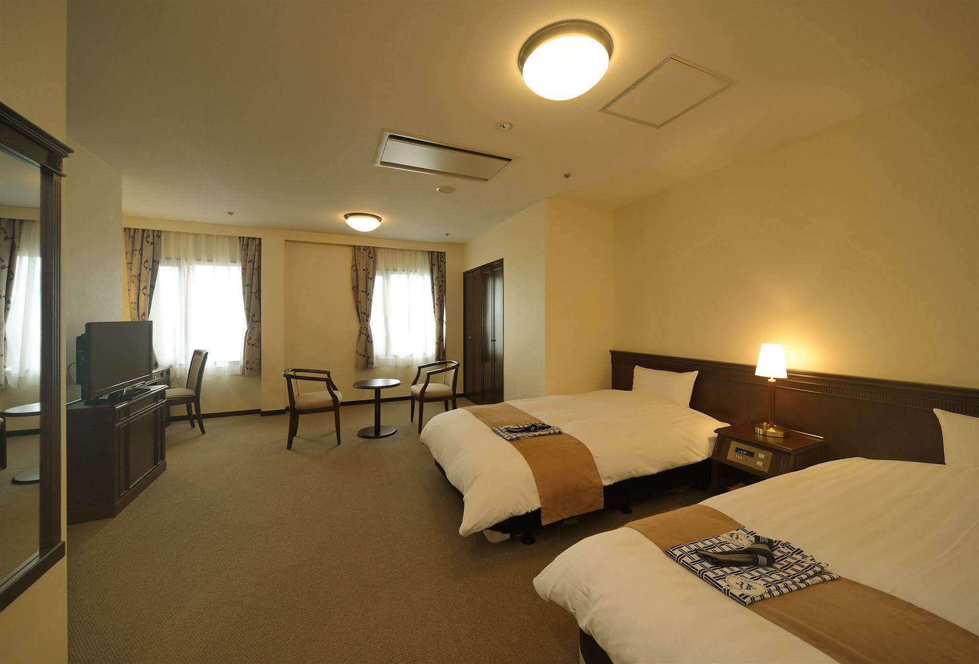 Amami Sunplaza Hotel Extérieur photo