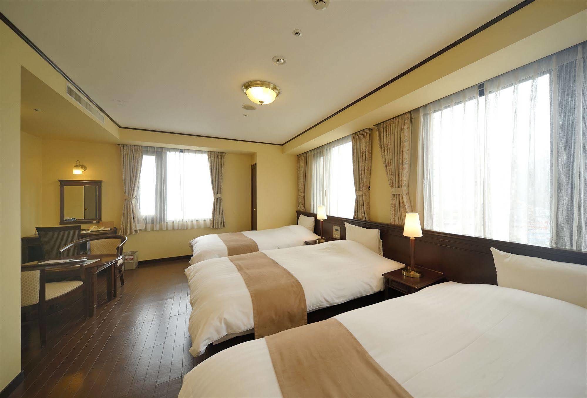 Amami Sunplaza Hotel Extérieur photo