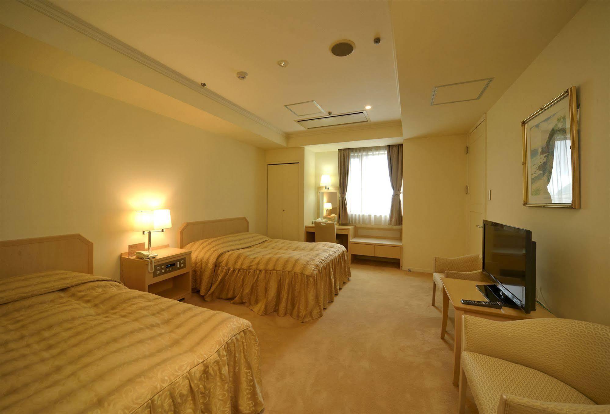 Amami Sunplaza Hotel Extérieur photo